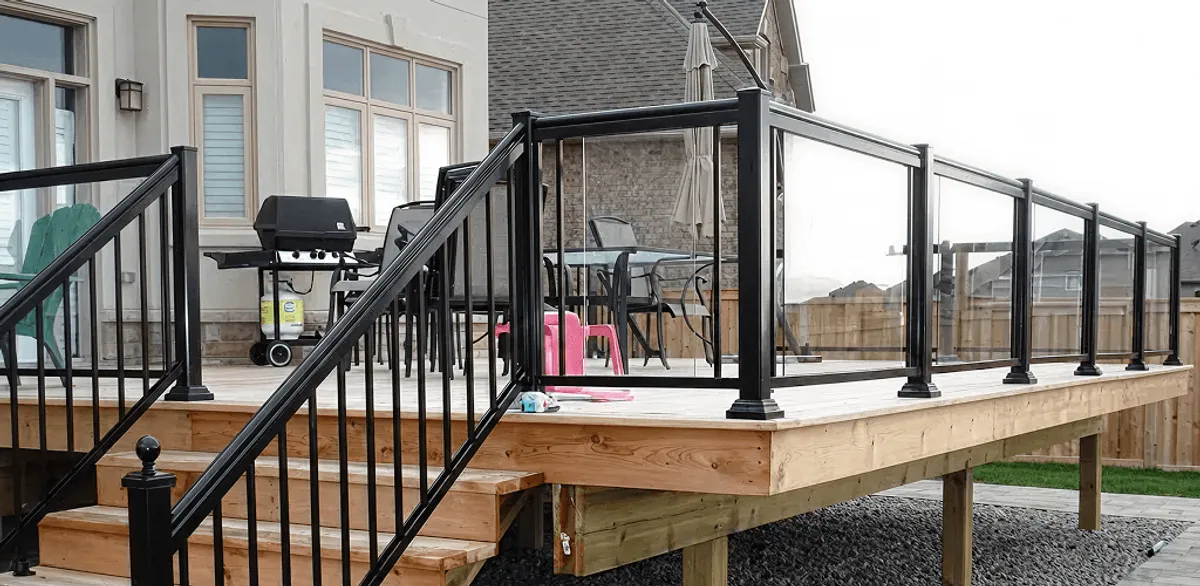 Handrail installation on a deck staircase for safety and code compliance in Nashville, TN